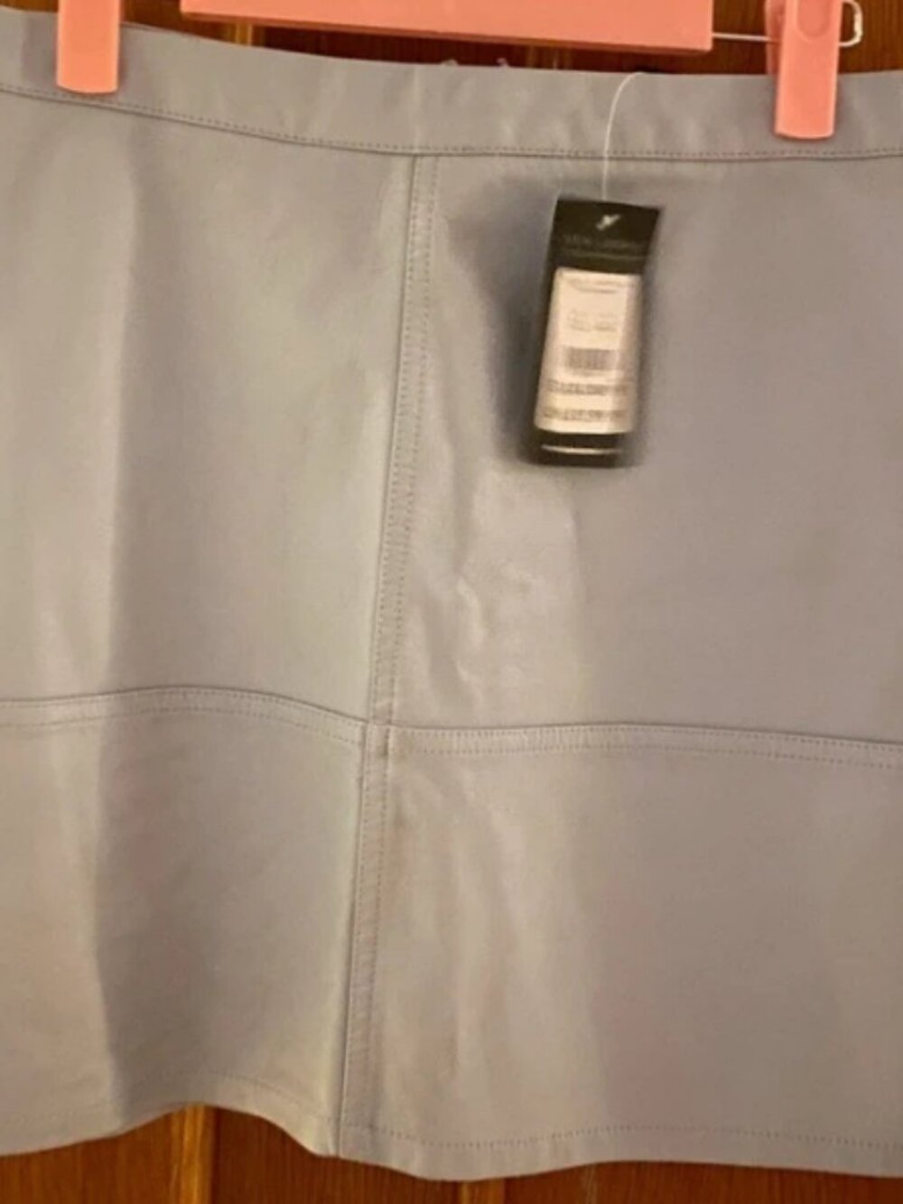 Elegant light blue leather skirt